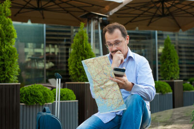 Employee navigating unfamiliar city during business trip.