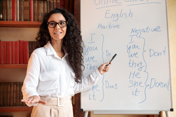 Overseas Teacher Interacting with International Students