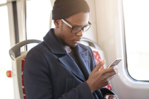 Teacher on Train Checking In On Phone