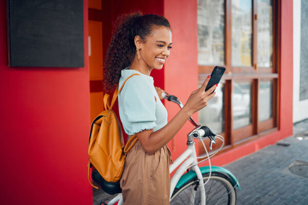 Solo Traveler Checking in on Phone