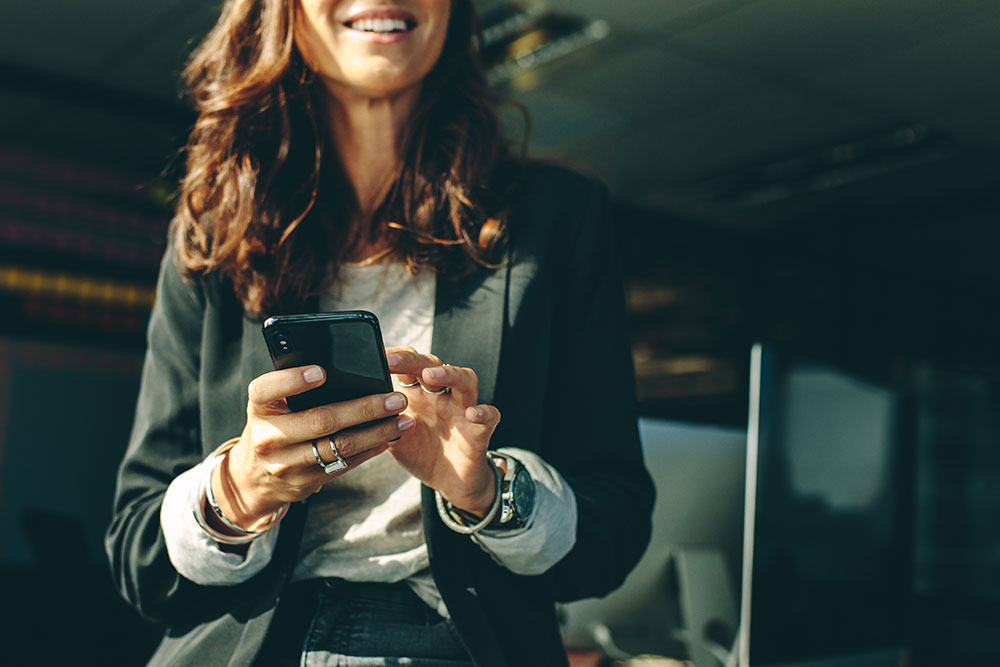 Woman Checking in on Phone