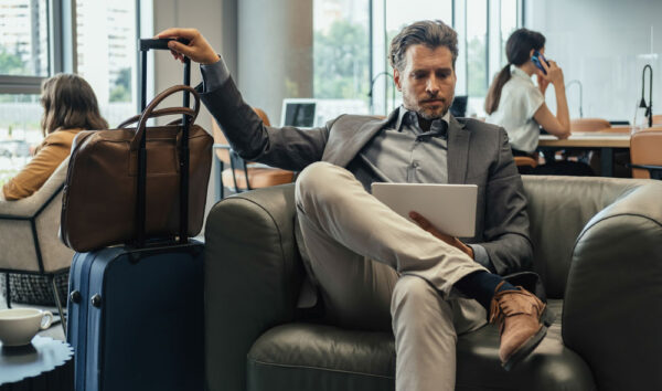 Executive Traveler Using a Mobile Safety Application While Abroad