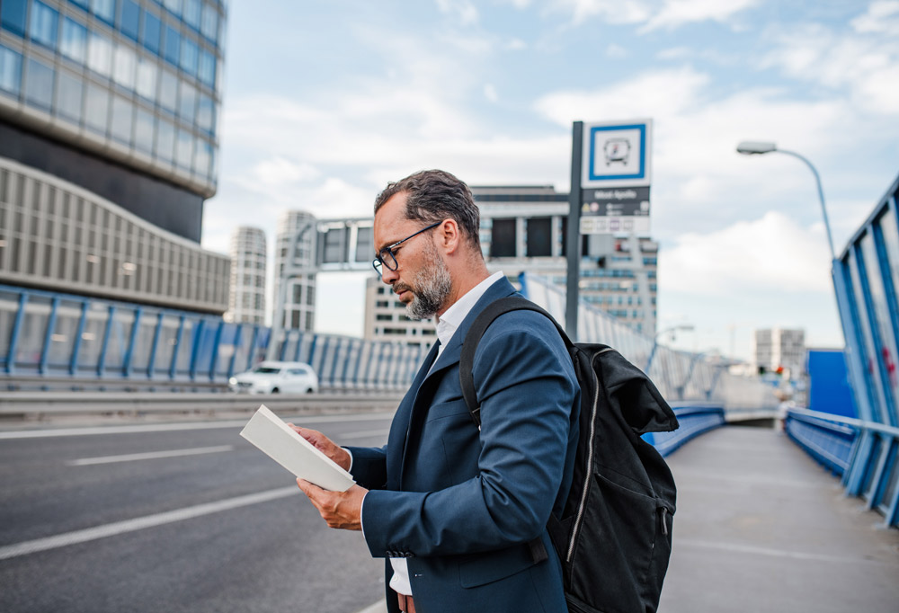 Business Traveler Navigating an Unfamiliar City Between Meetings