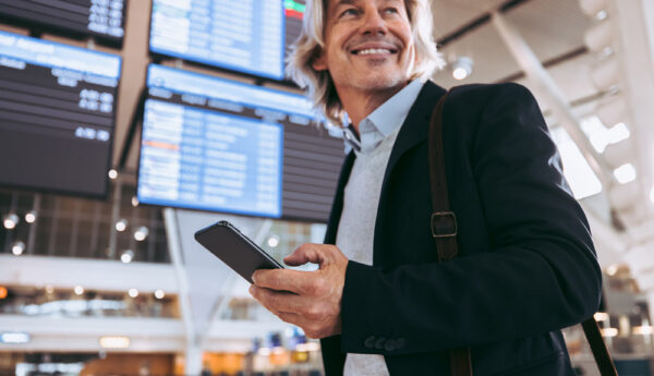 Business Traveler Reviewing Security Alerts Before an International Trip