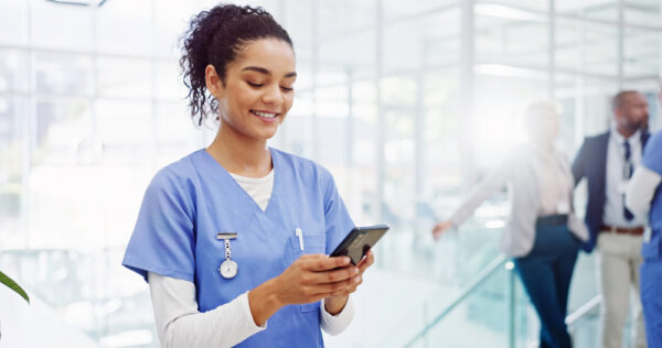 Traveling Healthcare Worker Checking in Using a Mobile Safety Application Abroad